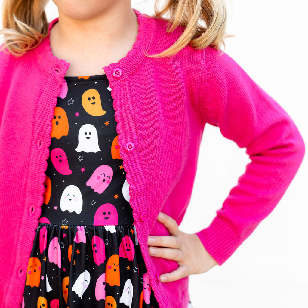 girls bright pink cardigan with halloween ghosts dress