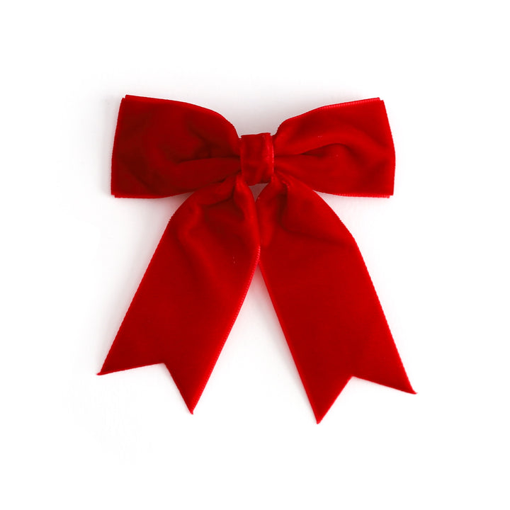 girls bright red velvet Christmas ribbon bow with dovetails on clip