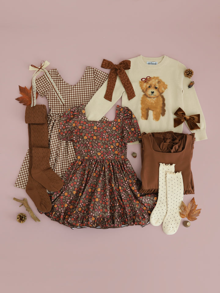girls mix and match brown and cream twirl dresses with matching puppy sweater, socks, tights and bows