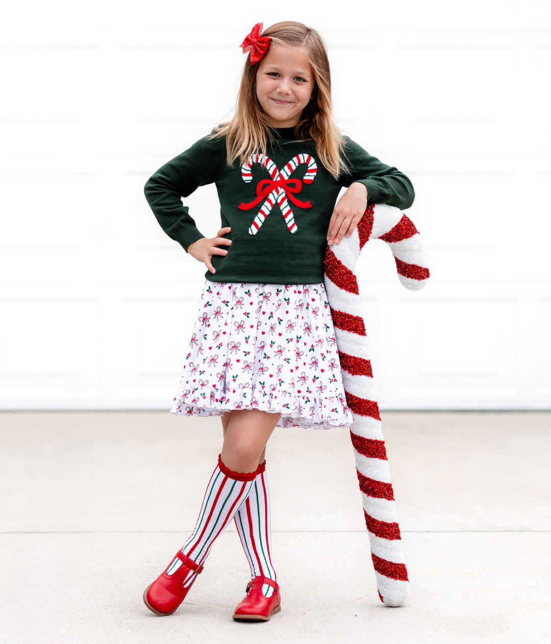 matching candy cane dress and sweater set for girls