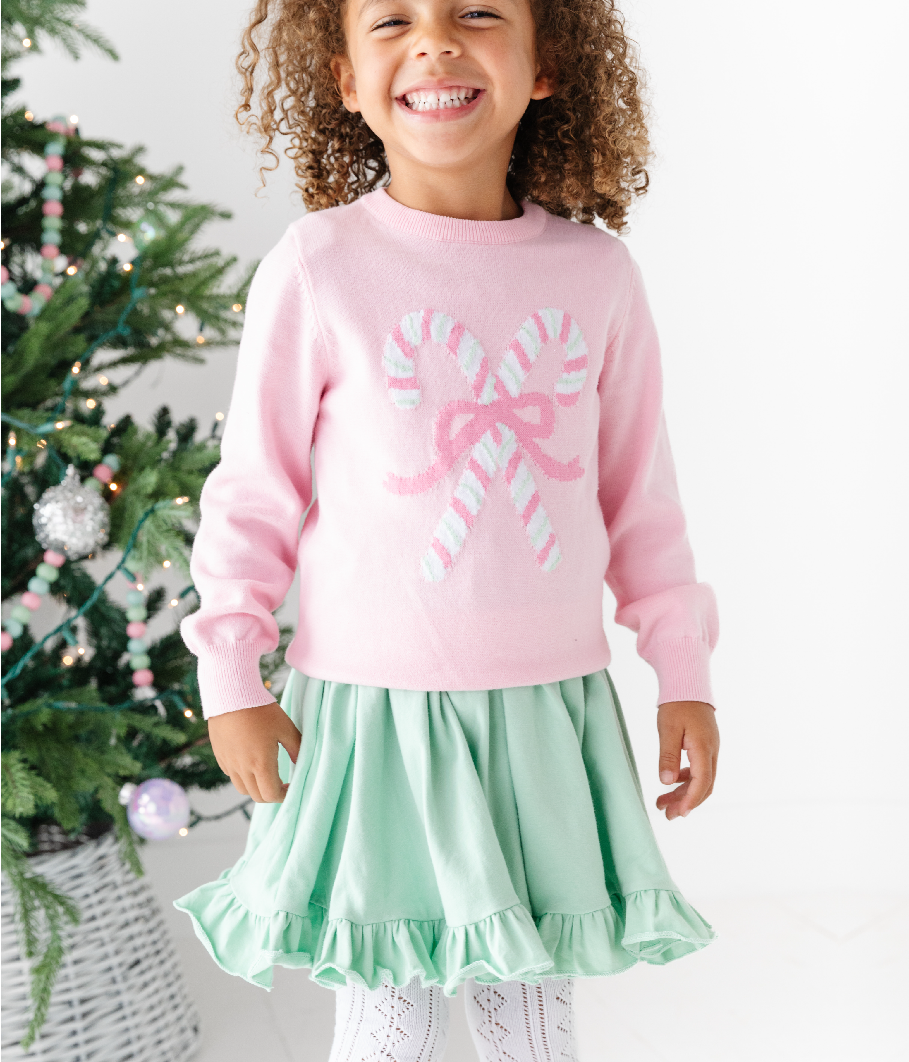 girls pastel Christmas outfit with pink candy cane pullover sweater and mint cotton twirl dress