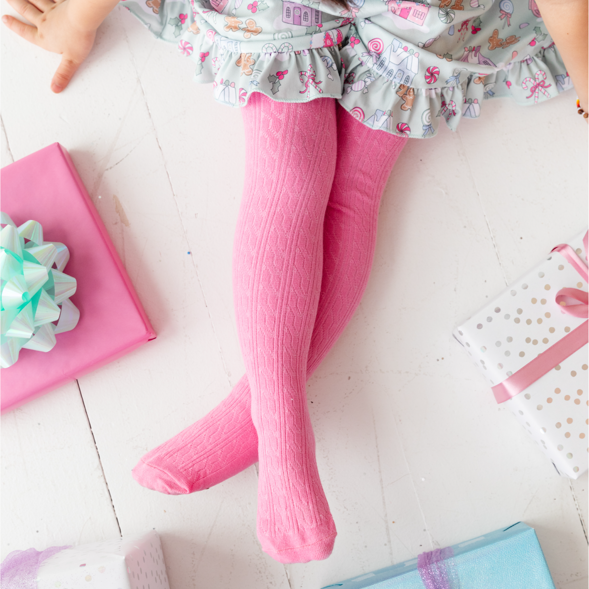 girls pink cable knit tights with pastel Candyland print twirl dress