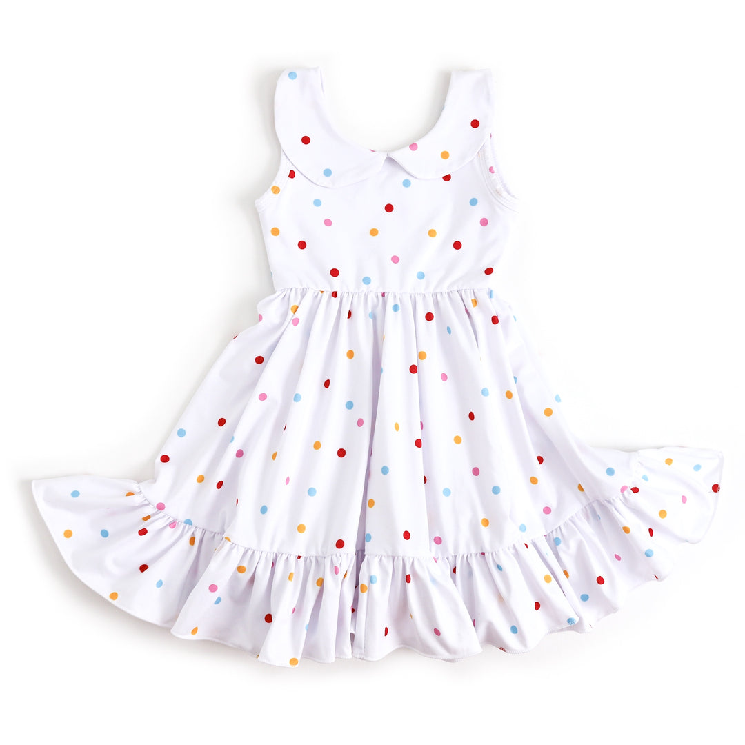 girls white tank top style dress with peter pan collar and rainbow polka dots throughout