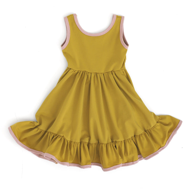 citron summer twirl dress with blush pink contrasted binding. 