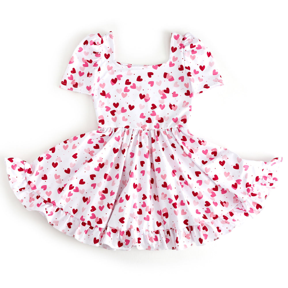 girls white square neck twirl dress with scattered hearts in shades of red and pink for Valentine's Day