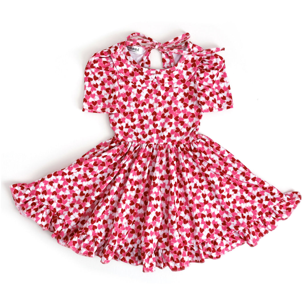 girls collared twirl dress with red, pink and white confetti heart print for Valentine's Day