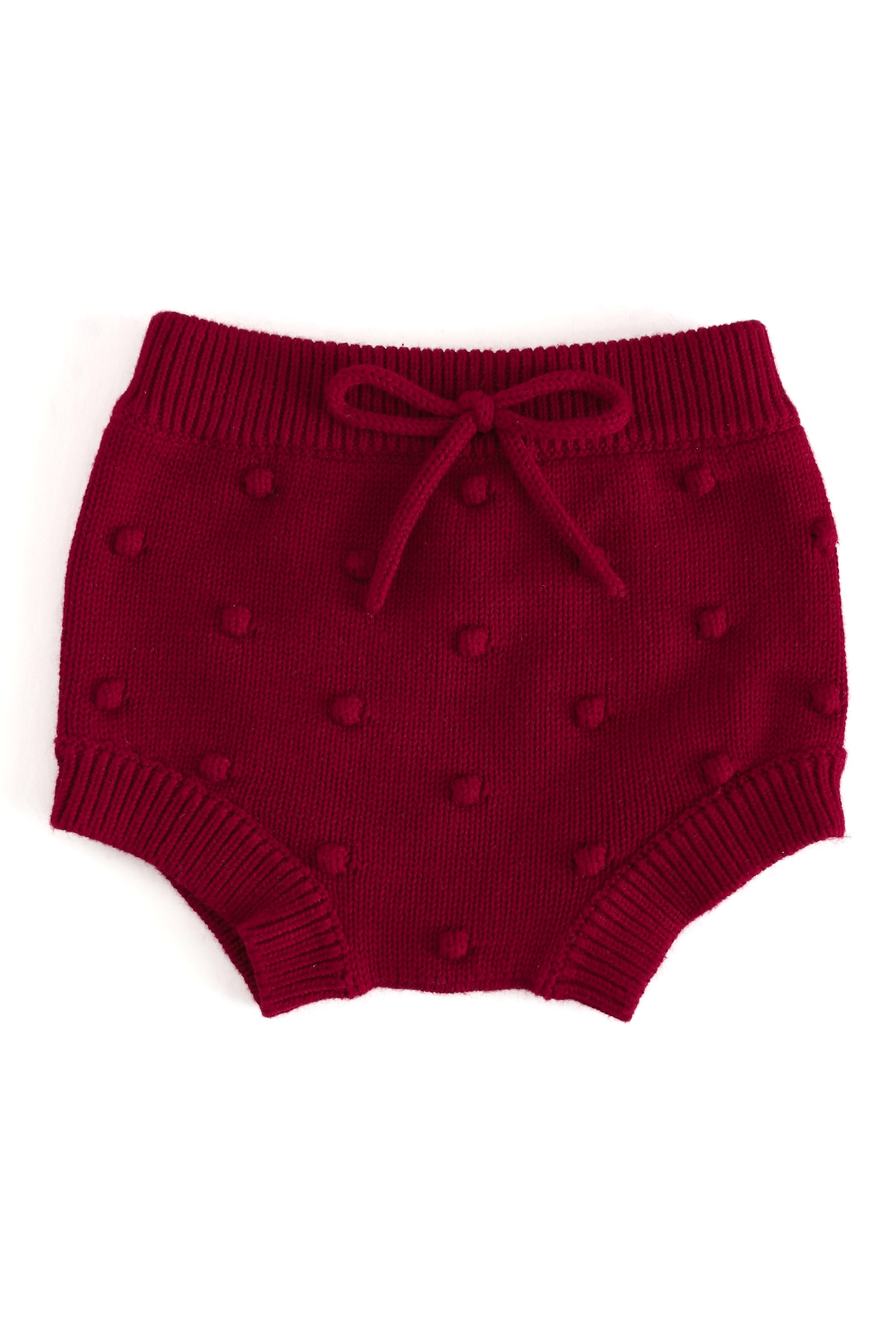 crimson bubble knit cotton baby bloomers shown on white background