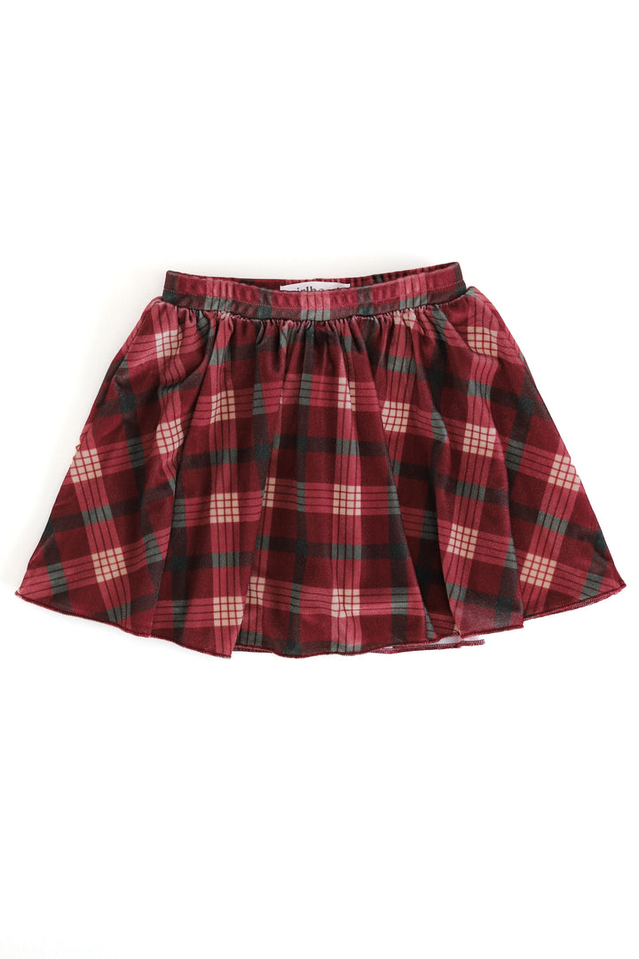 A red and green plaid velvet skort with an elastic waistband, shown flat against a plain white background.