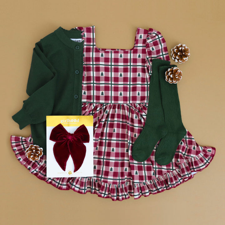 little girls gingham tree print Christmas dress with matching green and red accessories