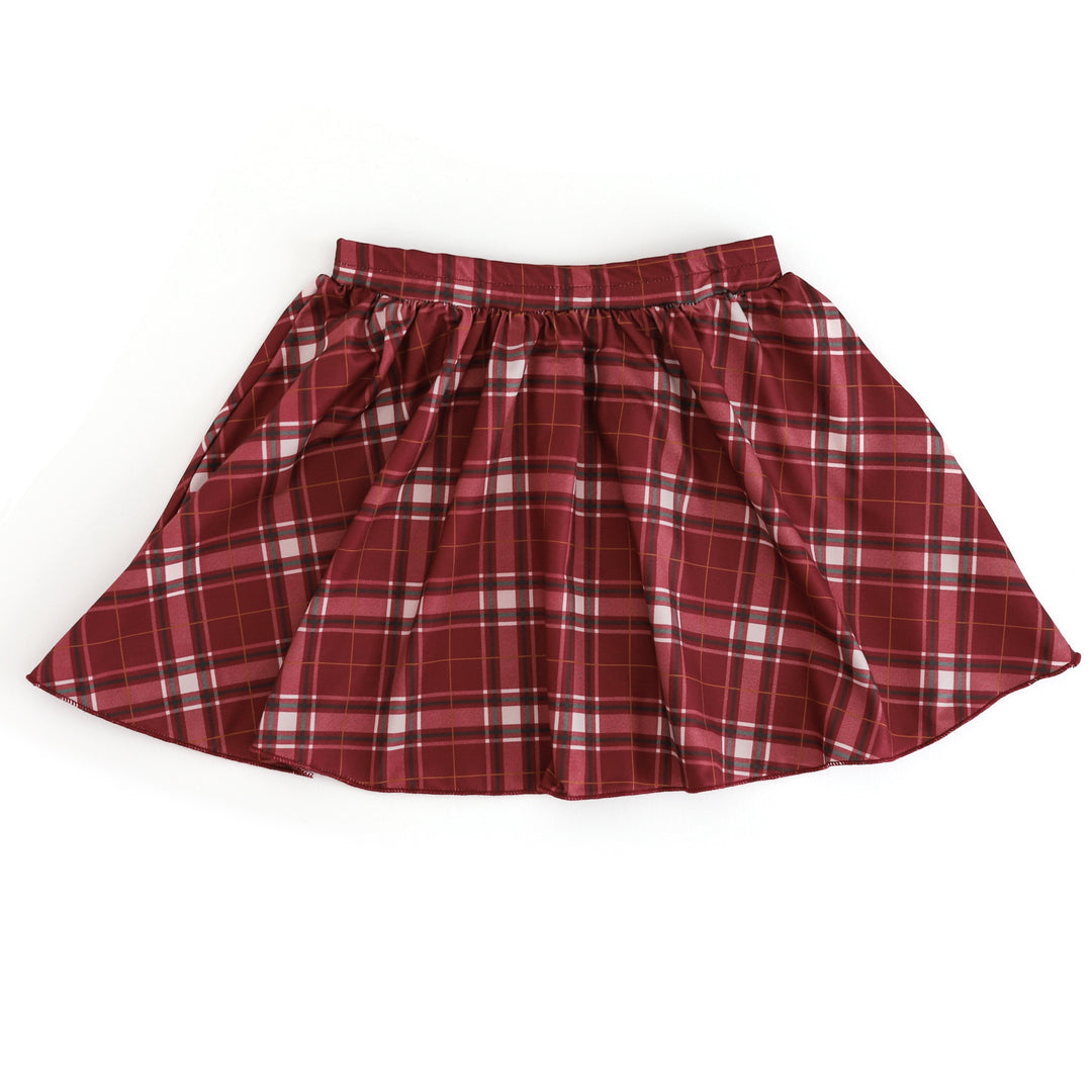 girls twirl skirt for Christmas in crimson plaid