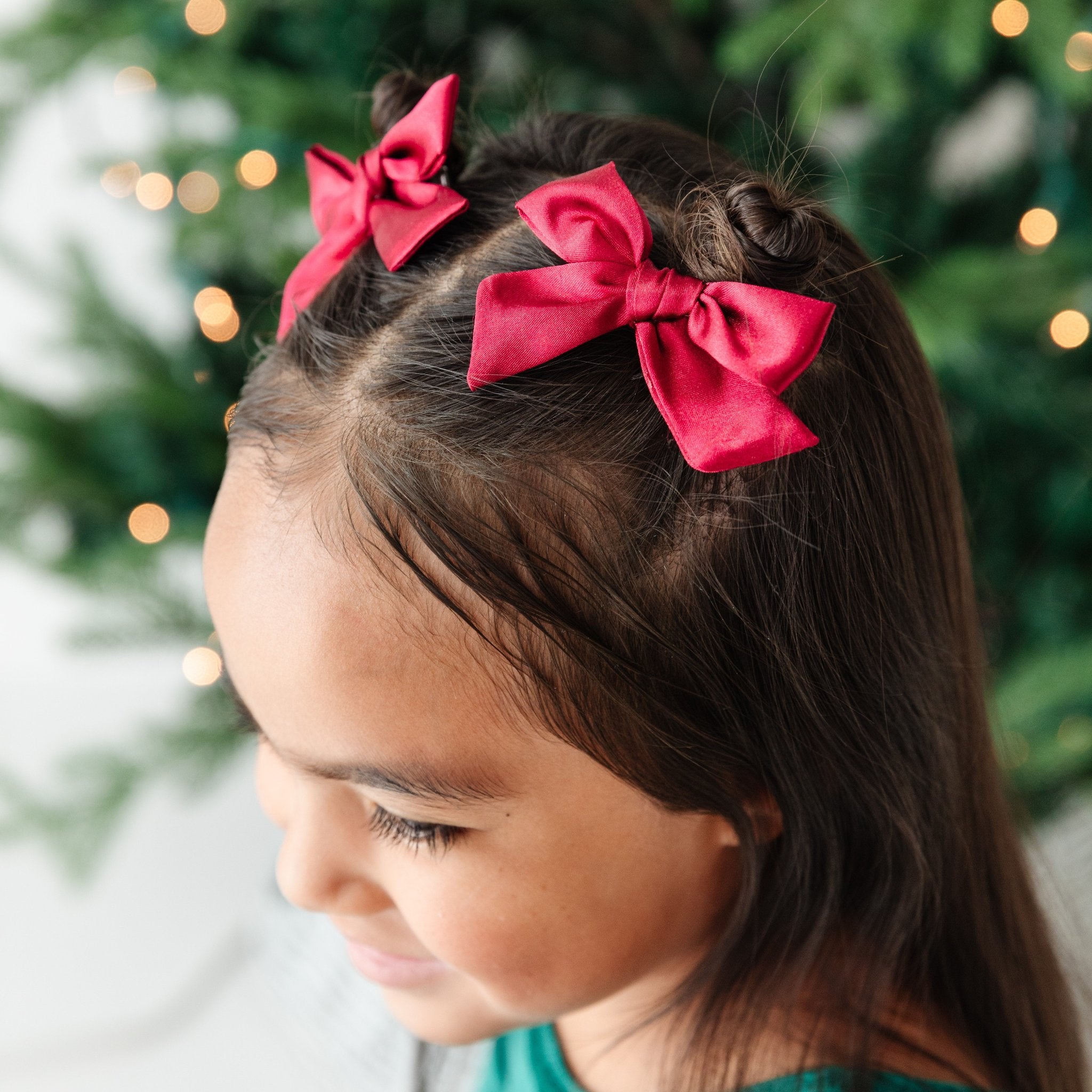 red satin set of Christmas pigtail bows for girls