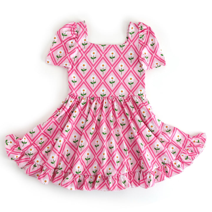 girls' pink square neck, short sleeve twirl dress with taffy pink scalloped diamond print and white daisies