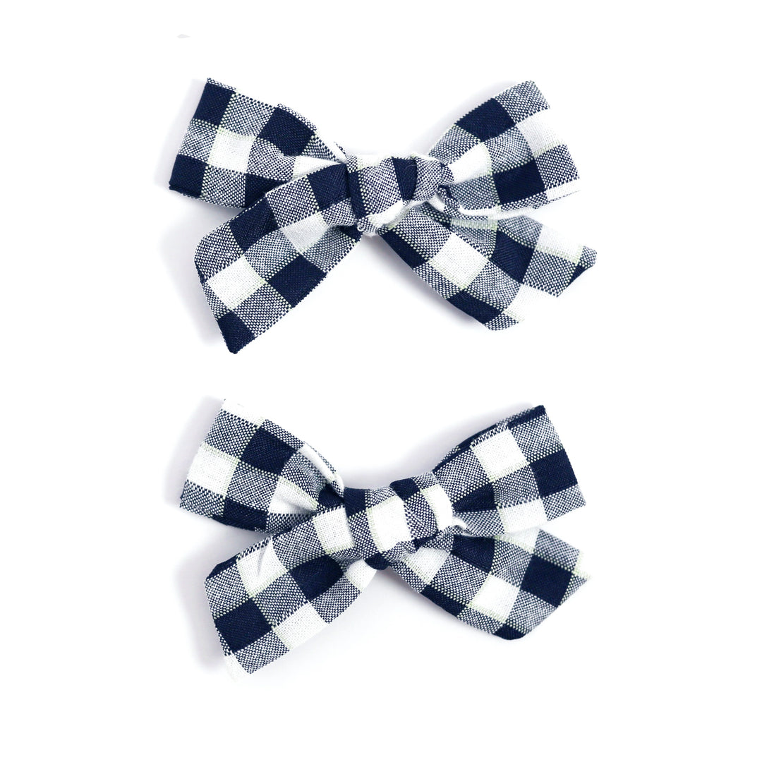 girls' darn navy blue and white gingham pigtail clips