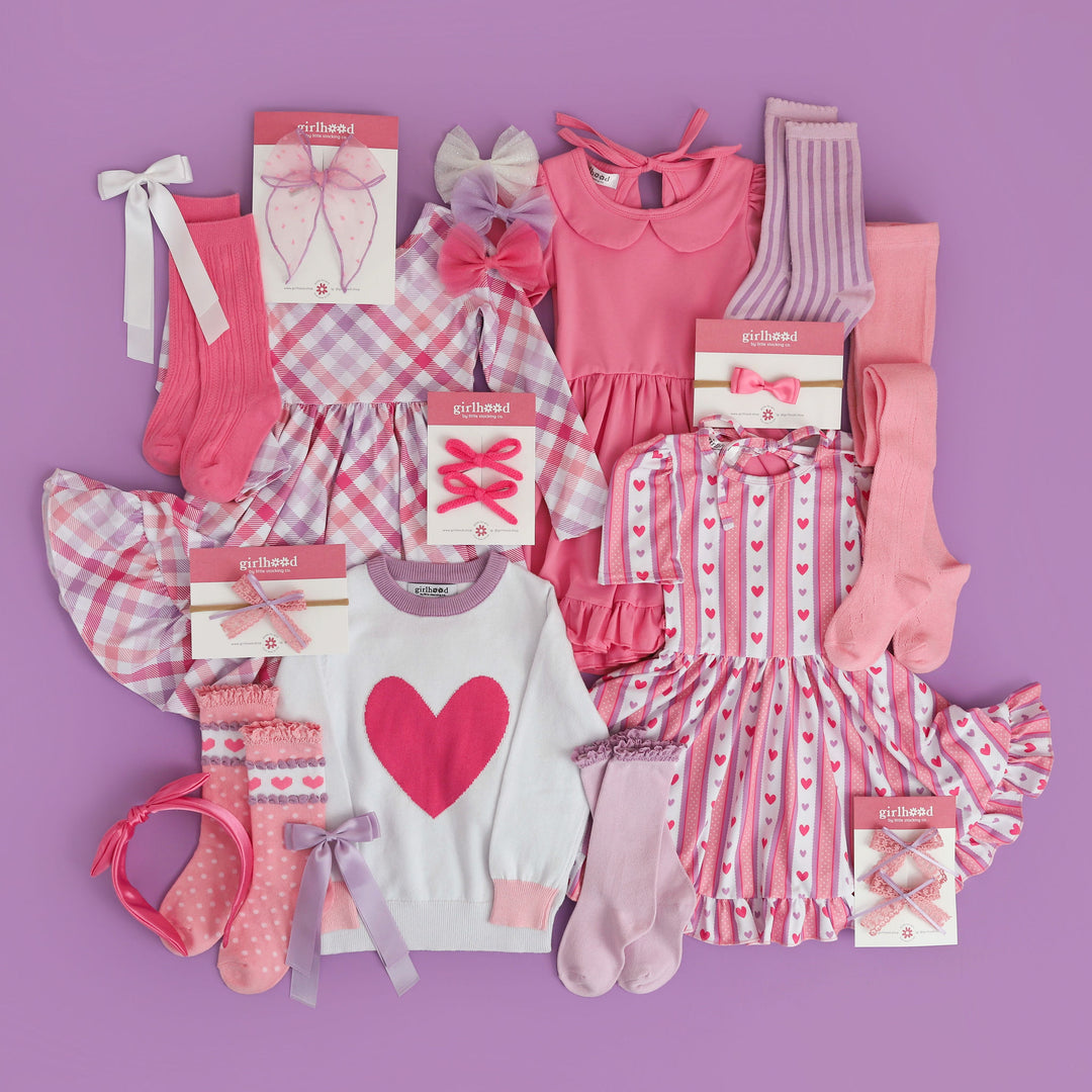 girls pink and purple valentine's day outfits with matching accessories