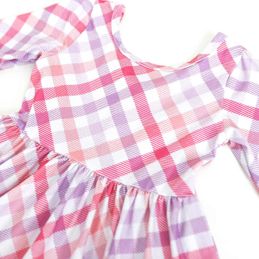 print closeup of white, pink and lavender gingham twirl dress 