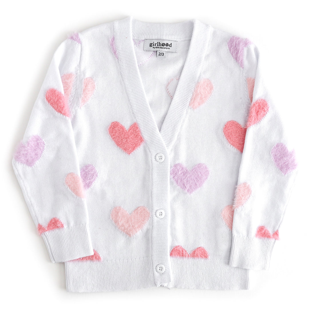 girls white V-neck cardigan with buttons and fuzzy pastel hearts in shades of pink and purple for valemntines day