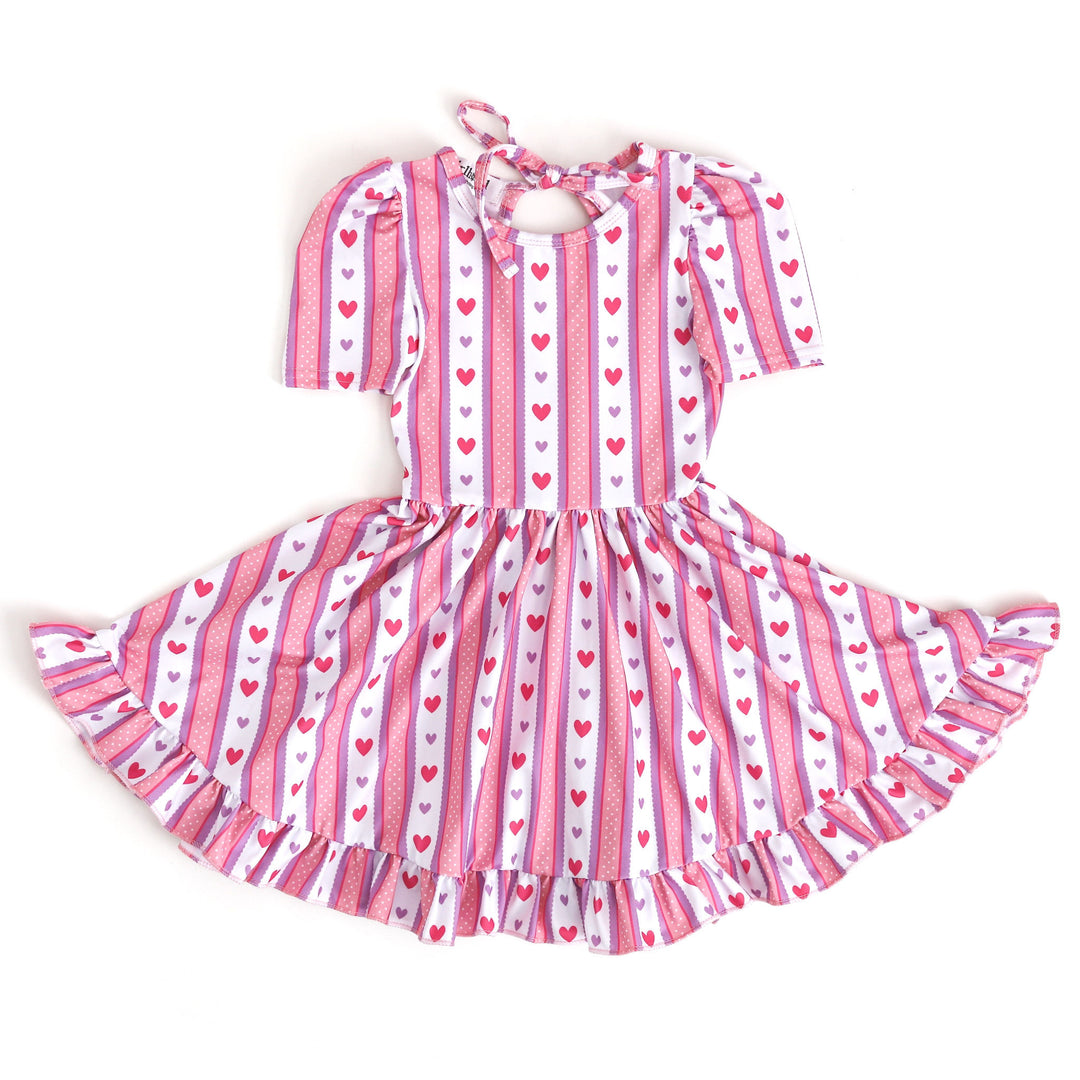 girls twirl dress with tie back in pink, purple and white Valentine's Day vintage wallpaper inspired print