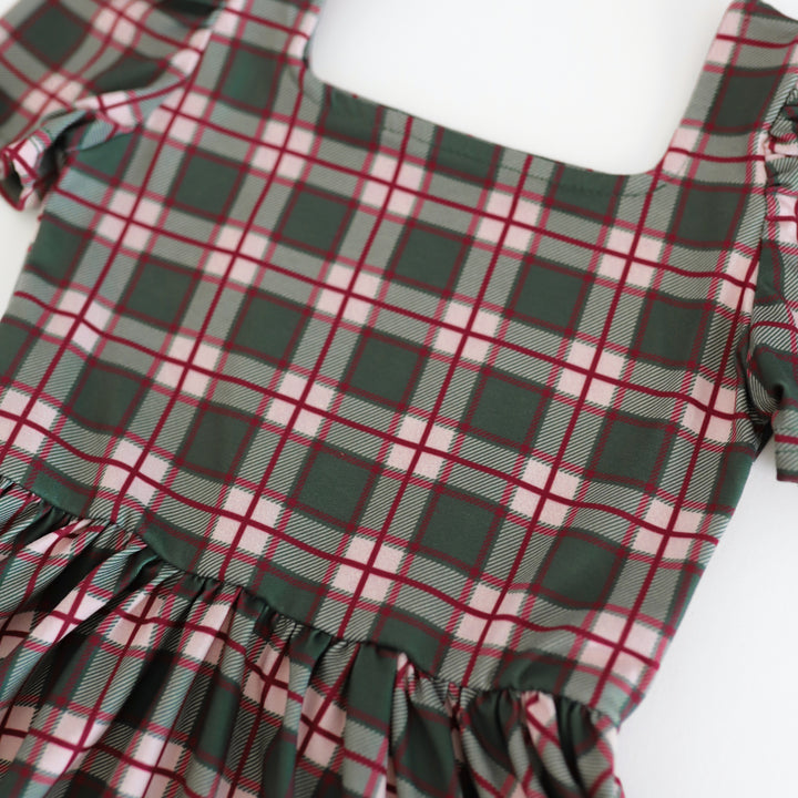 closeup of forest green and crimson plaid Christmas dress print