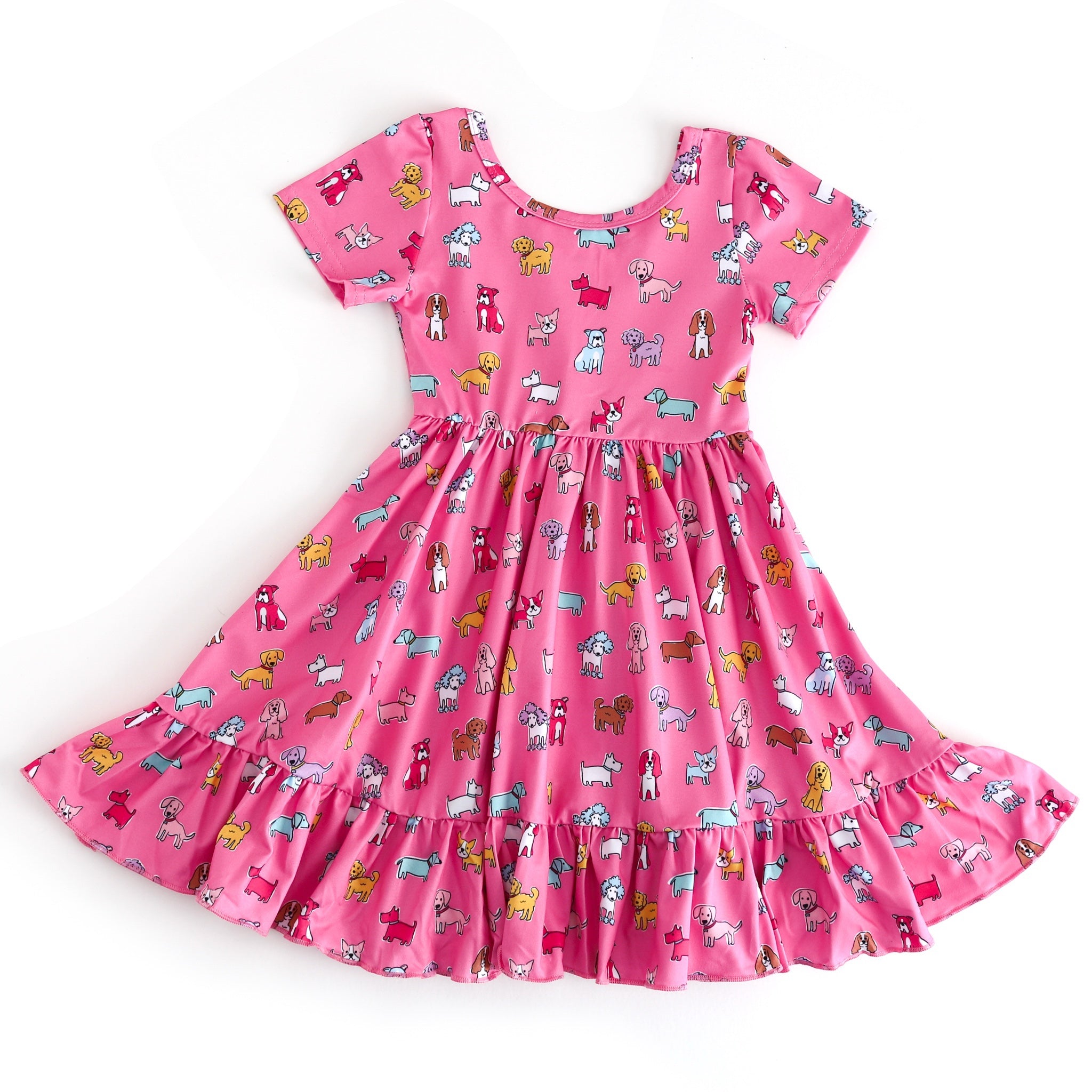 Pink dress with dog pattern on a white background