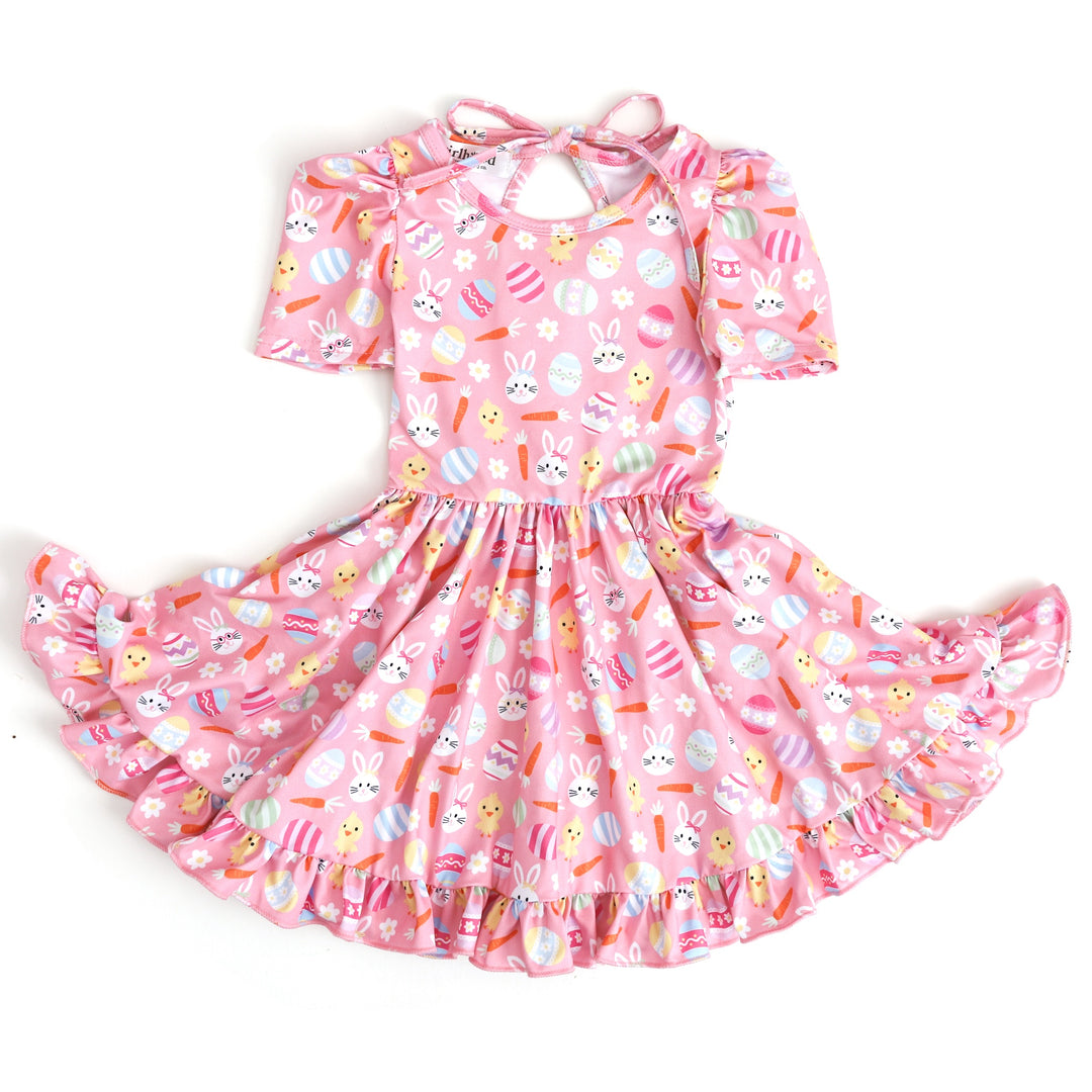 girl's short sleeve Easter print party dress with colorful easter eggs, bunnies, chicks and carrots on pink