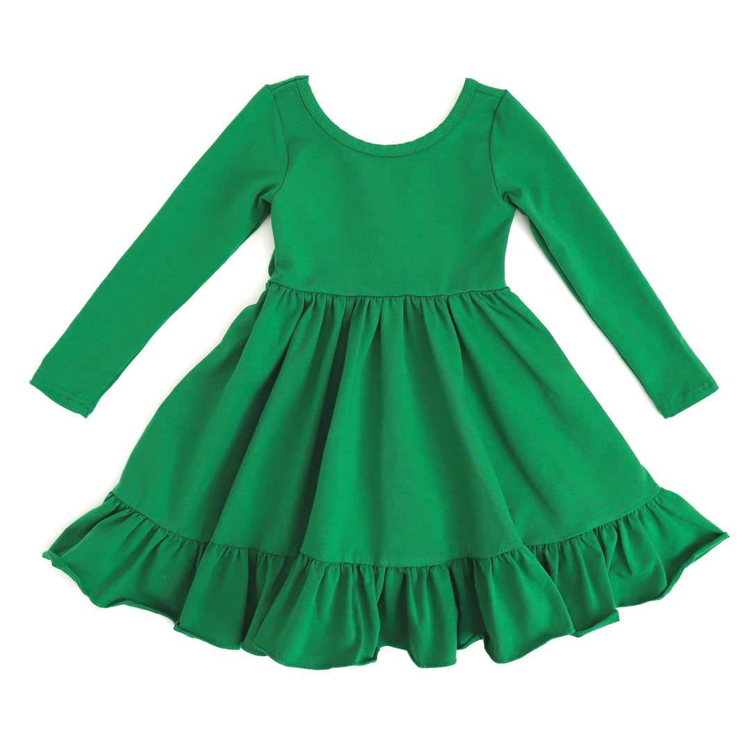 little girls cotton twirl dress  with long sleeves and pockets in classic Christmas green