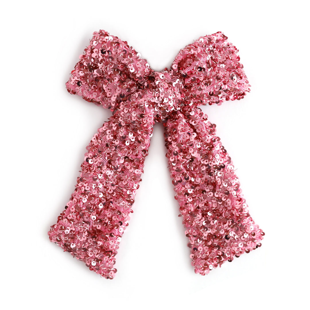 girl's large pink sequin bow on alligator clip 