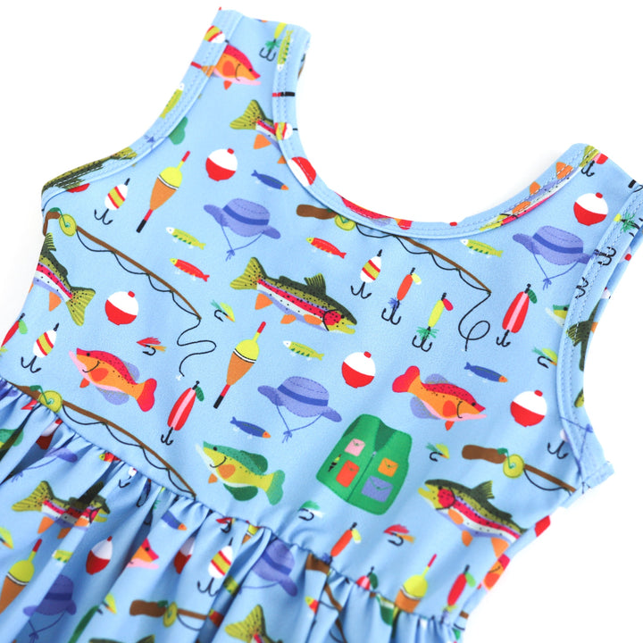detail of girls' fishing themed summer dress