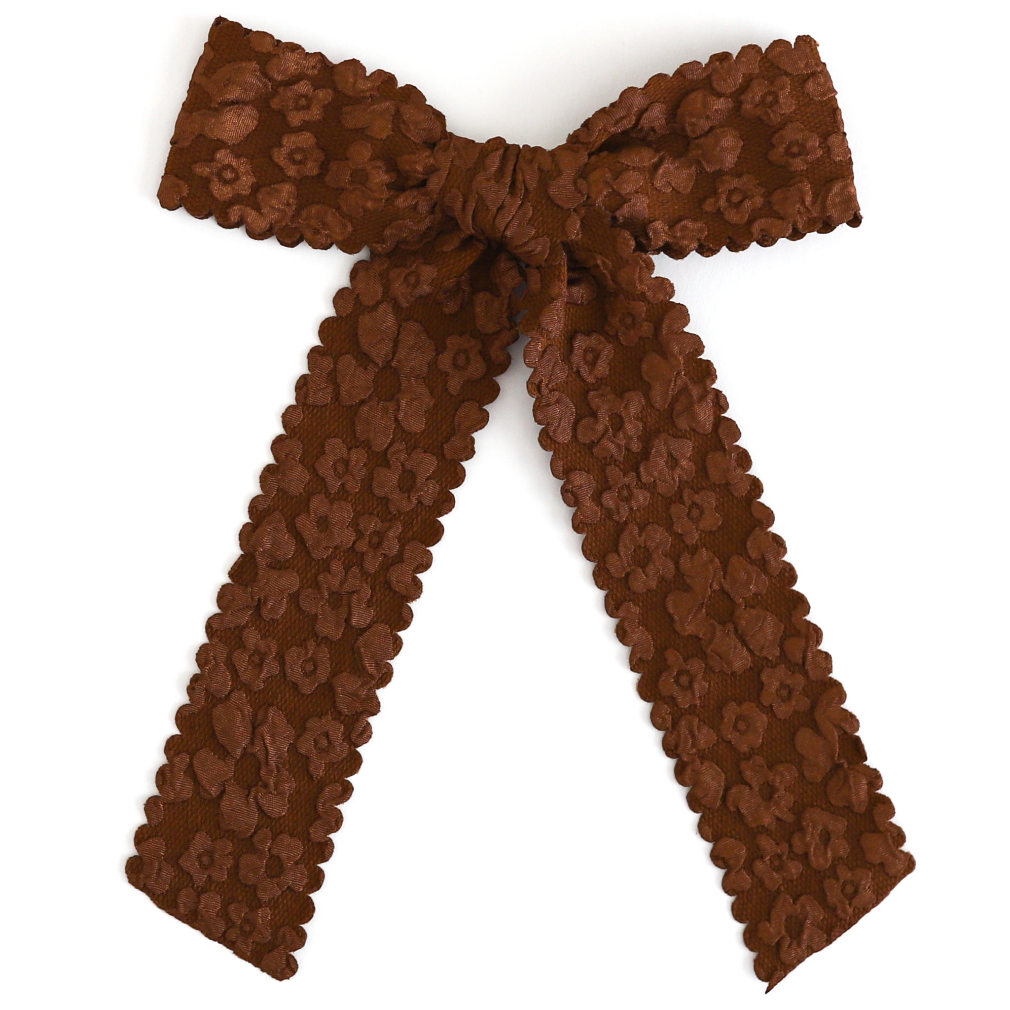 girls' brown floral bow with scalloped trim on alligator clip