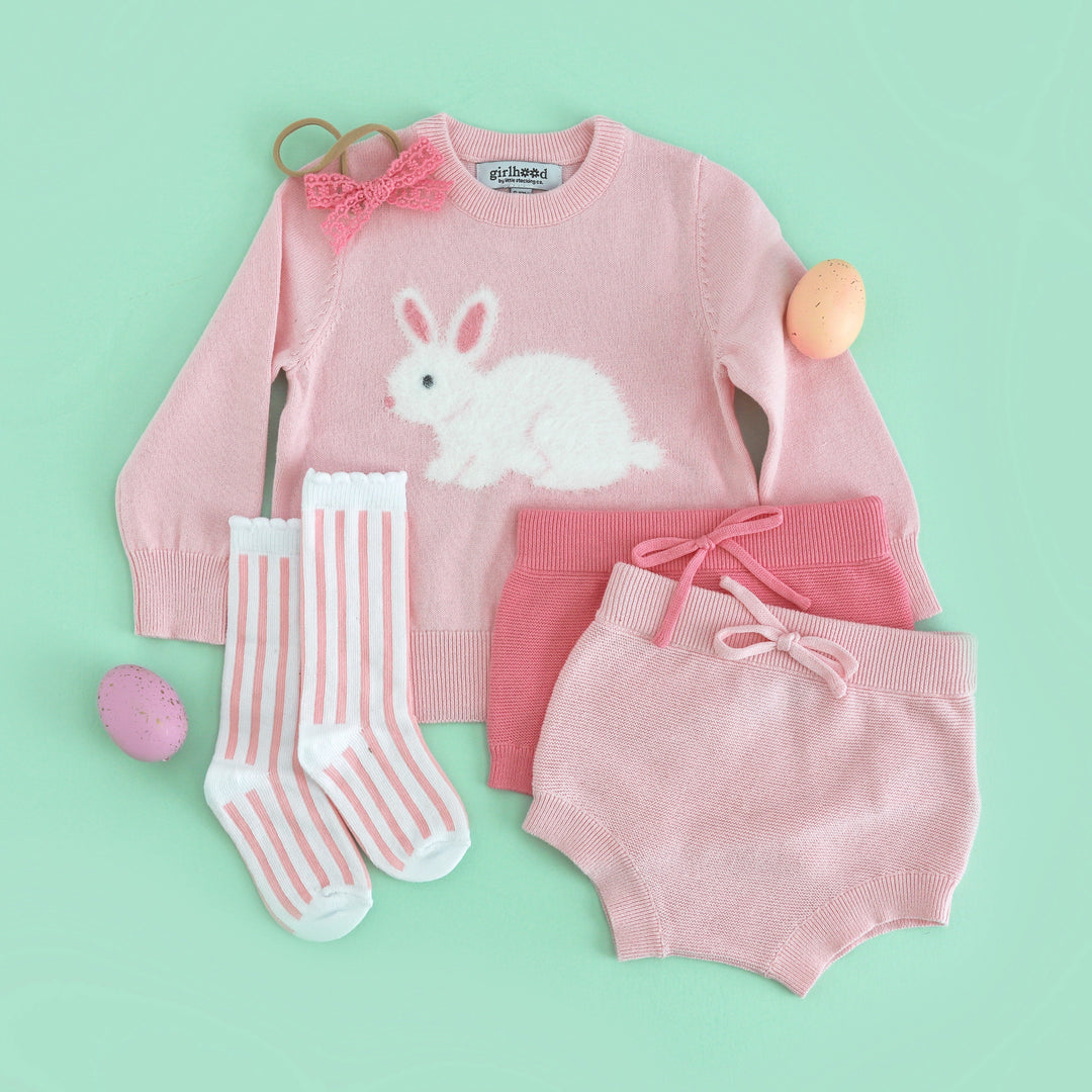 baby girl's easter outfit with pink fluffy bunny sweater, two pink cotton knit bloomer matches, pink striped knee socks and matching pink lace bow on nylon