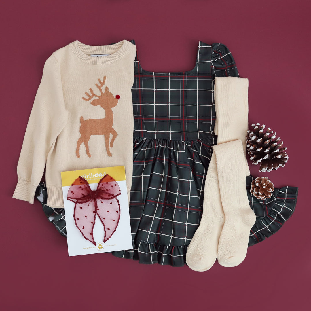 girls forest green plaid Christmas dress with matching reindeer knit sweater, fancy vanilla tights and sheer crimson bow