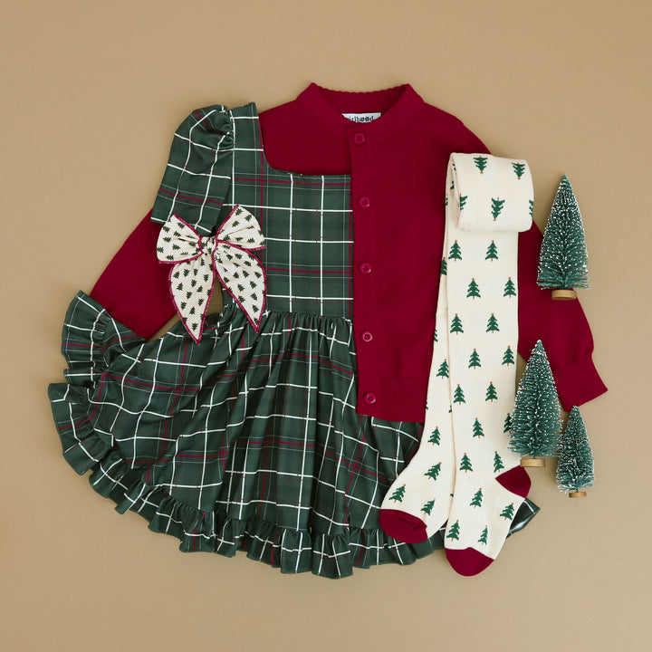 girls forest green plaid holiday dress with matching crimson knit cardigan and Christmas tree tights and bow