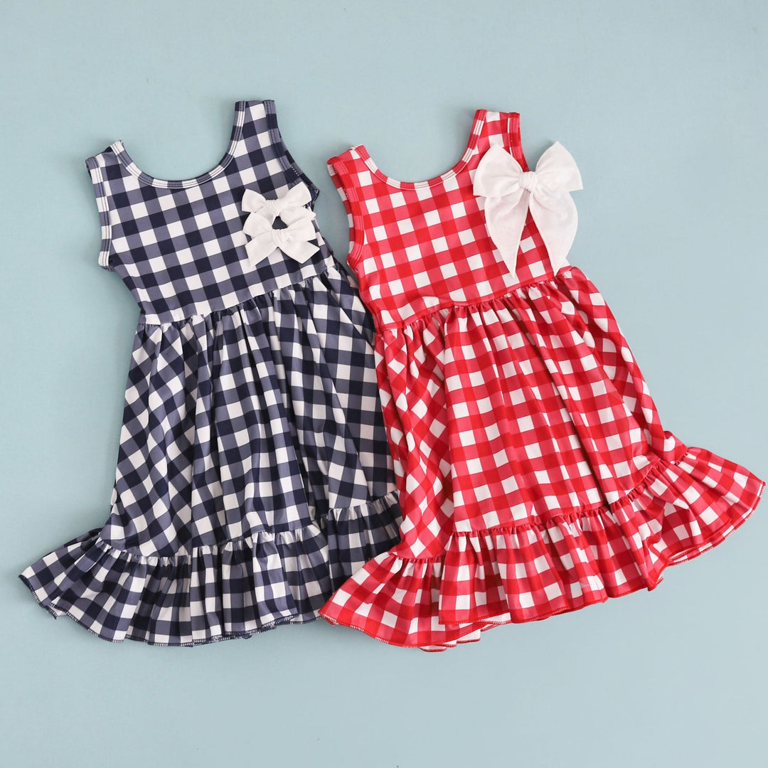 styled navy and red picnic plaid girls summer dresses with white linen hair bows