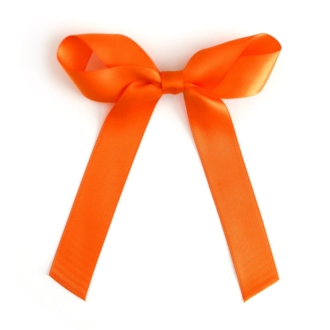 girl's satin orange ribbon bow on alligator clip for Halloween