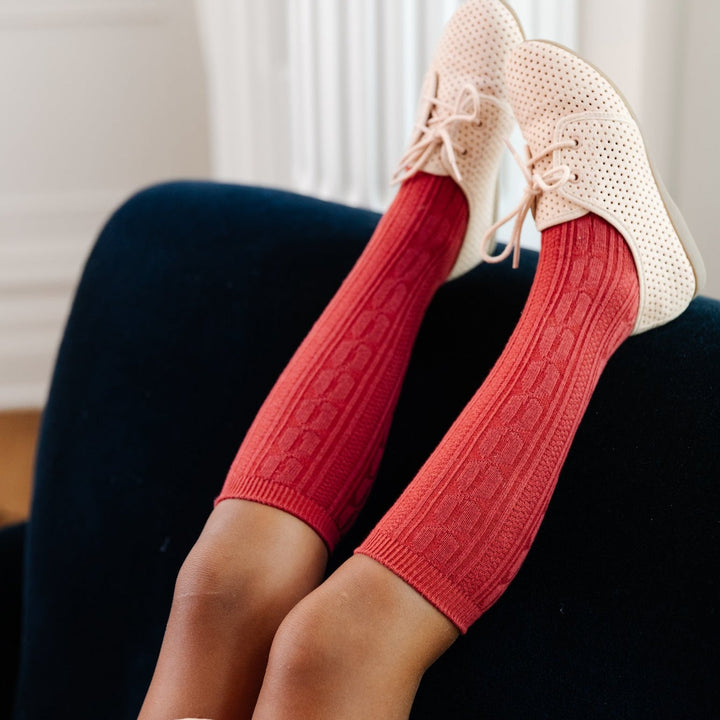 rust red cable knit knee high socks on girl