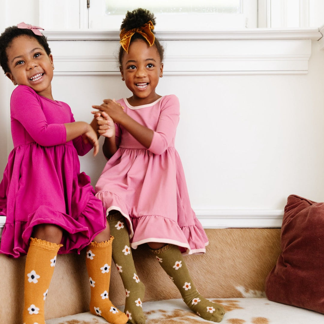 pink sister dresses with flower knit knee high socks