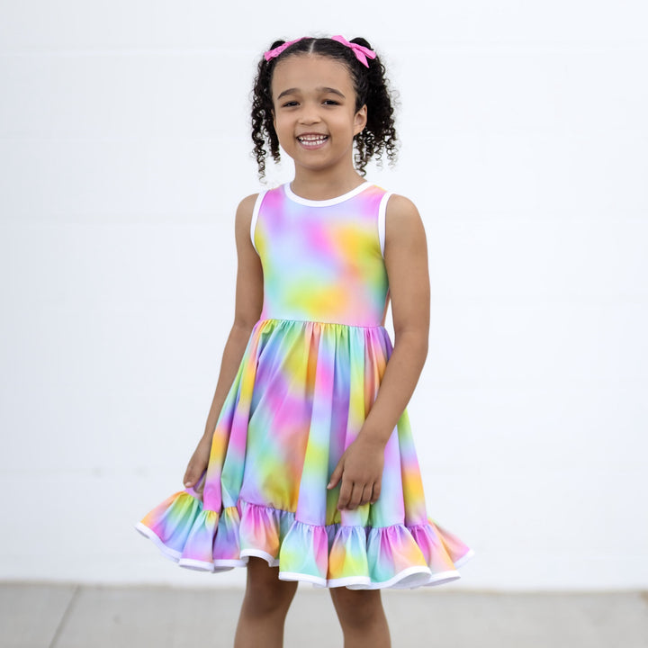 little girl in rainbow tie-dye tank style twirl dress