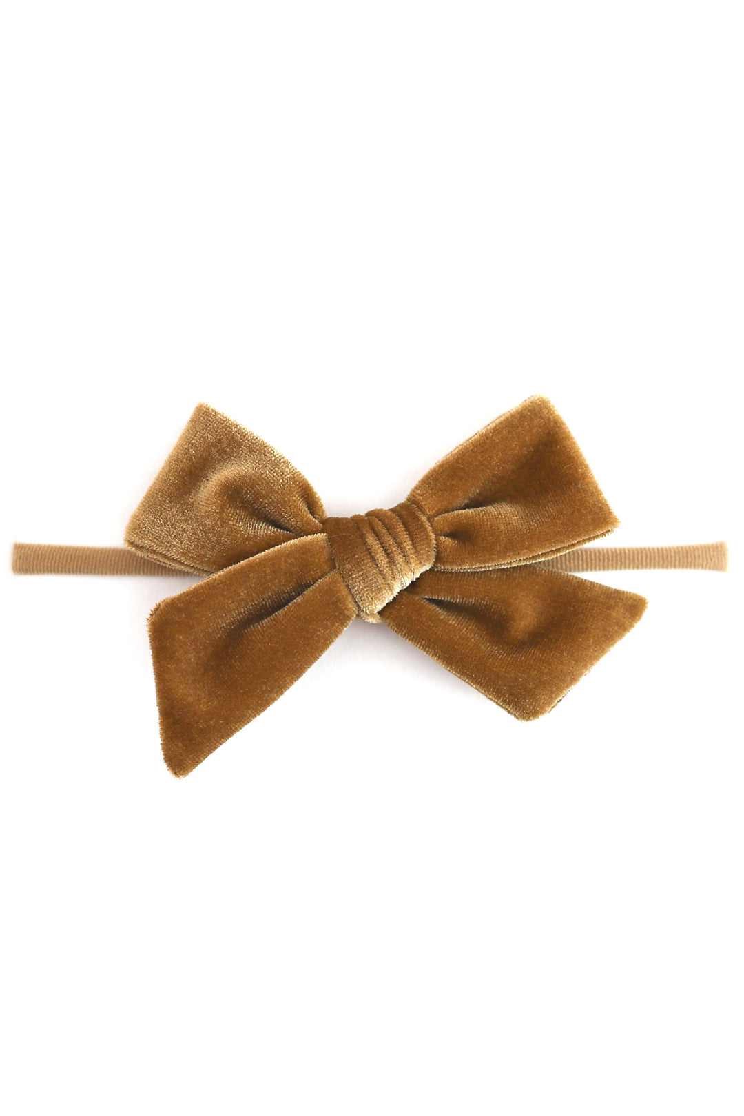 gold velvet baby bow on nylon headband shown on solid white background