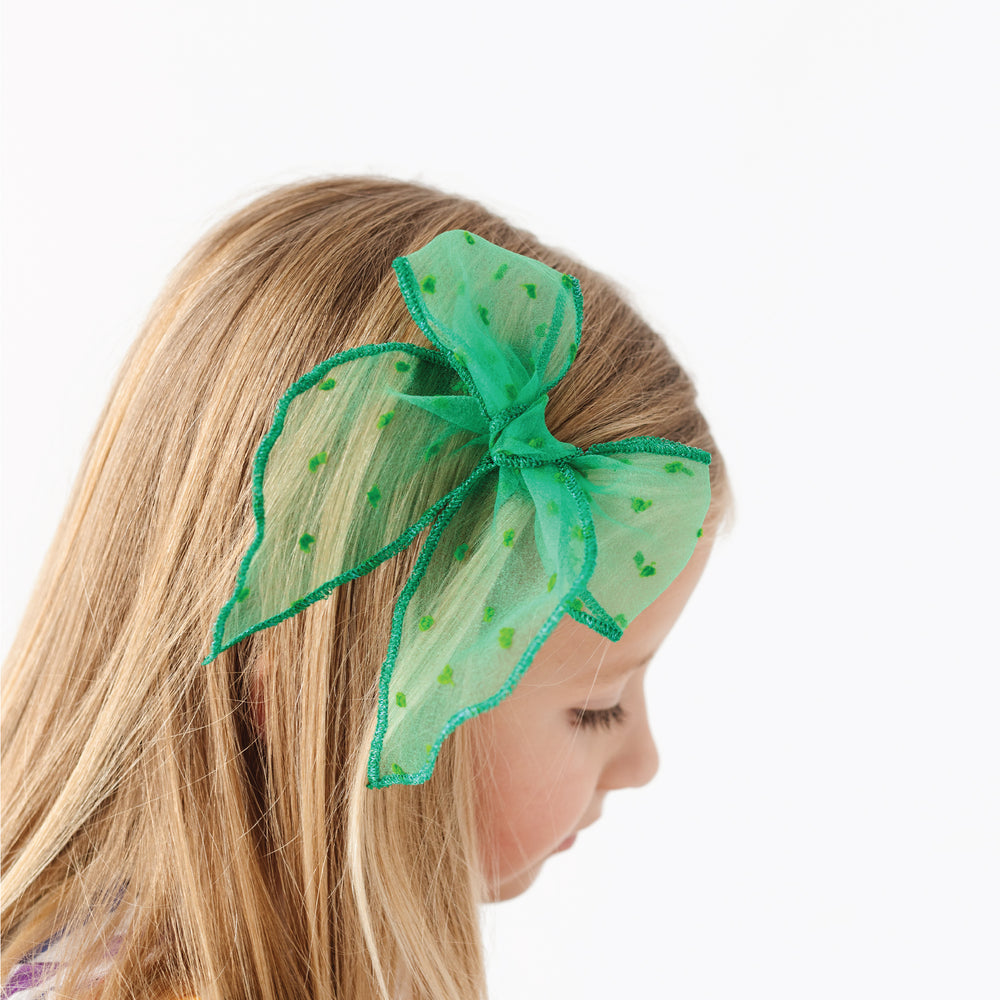 st. patricks day hair bow in sheer green shimmer with sparkly green trim