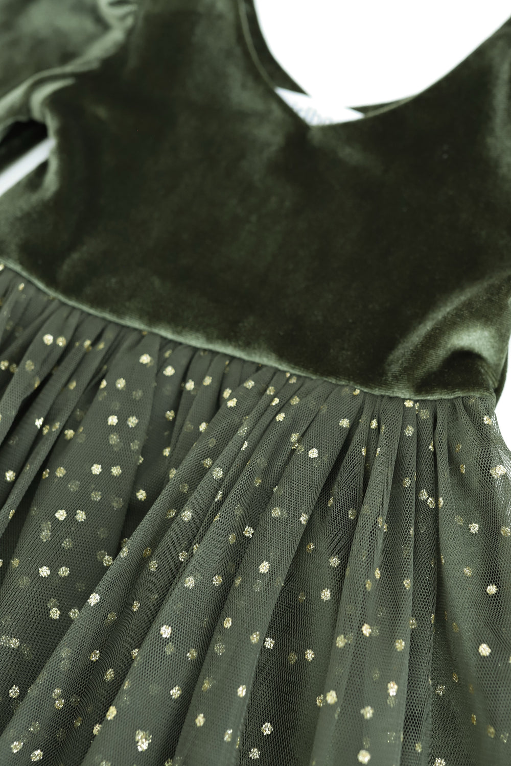 girls green christmas tutu dress detail image with sparkly gold dot tutu skirt