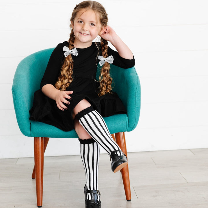 halloween stripe knee high socks with black and white vertical stripes