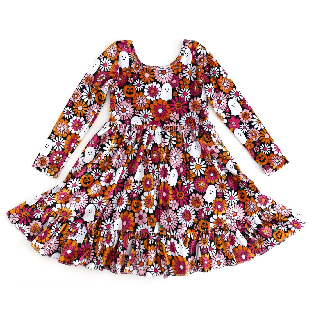 girls' velvet long sleeve twirl dress with mod floral print with ghosts and pumpkins in shades of pink, orange, white and black 