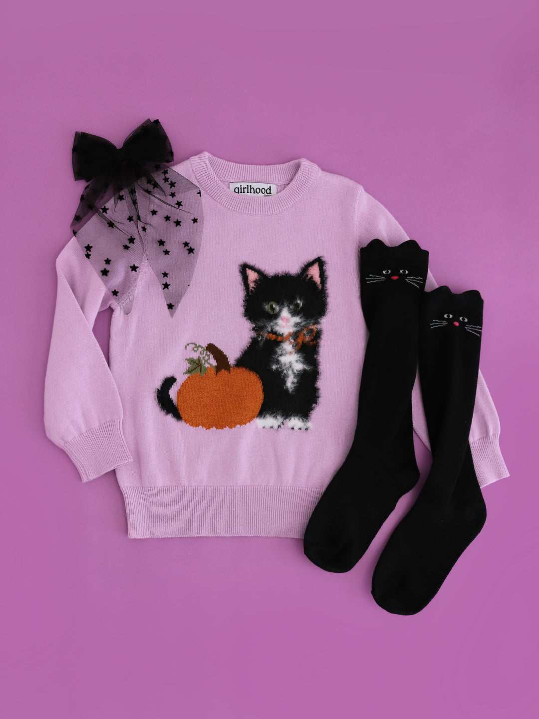 girls lavender cotton knit pullover sweater with fluffy kitten design and sparkly orange pumpkin paired with matching black cat knee socks and black  tulle hair bow with velvet stars