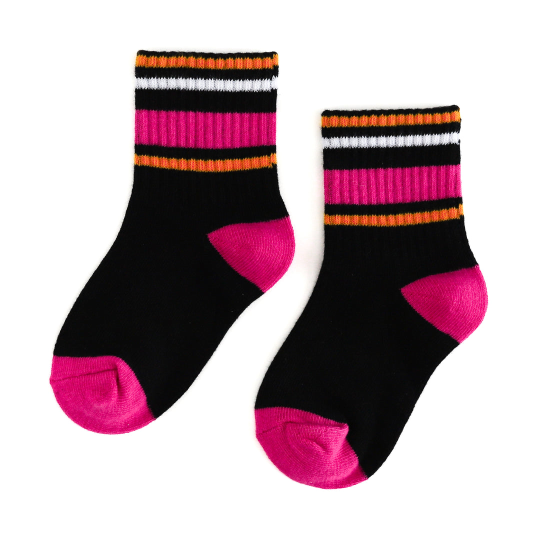 Black ribbed crew socks with hot pink, orange and white stripes for Halloween