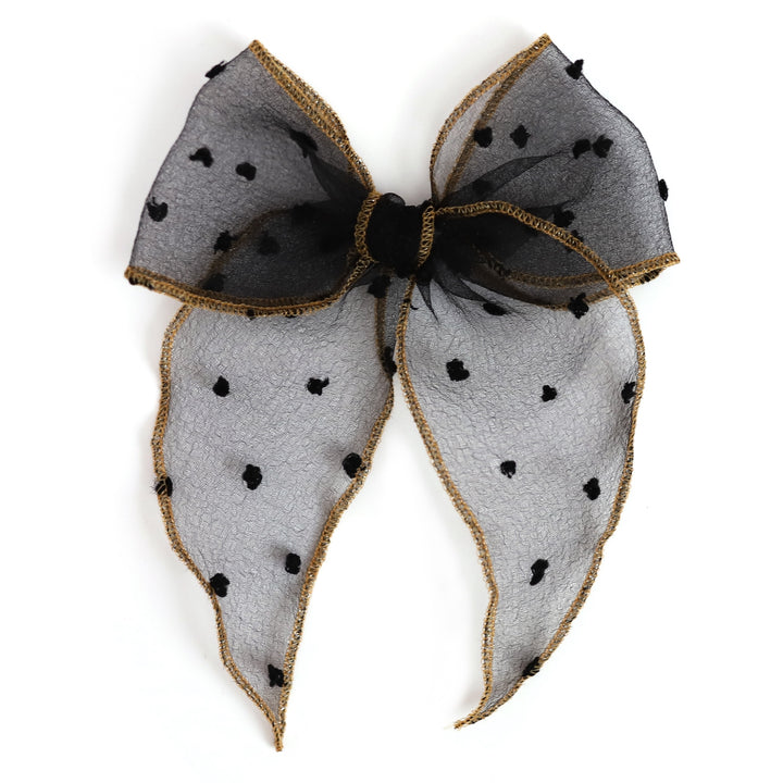 little girls' black sheer dot party bow with sparkly gold edging 