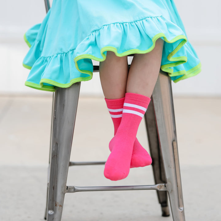 hot pink striped midi socks on little girl