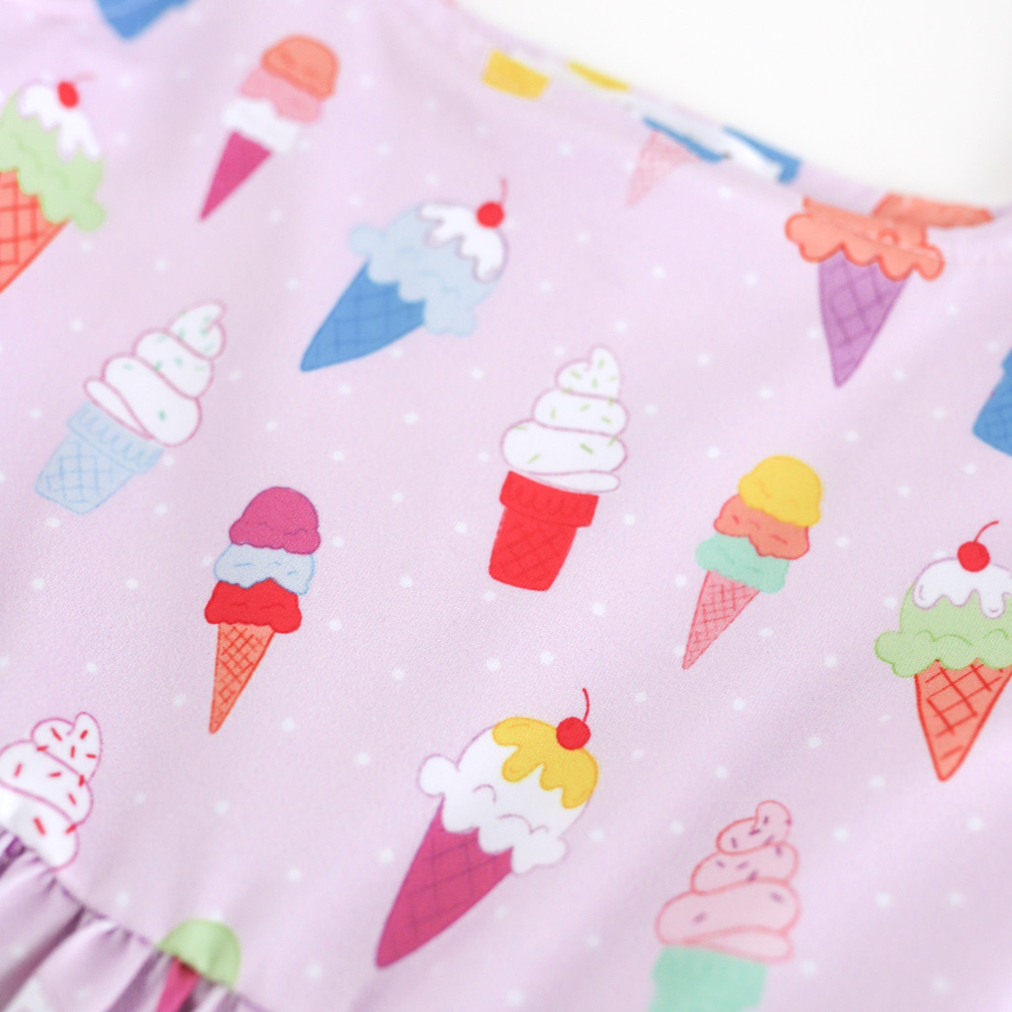 print detail photo for girl's summer twirl dress with multicolor ice cream cones and small white polkadots