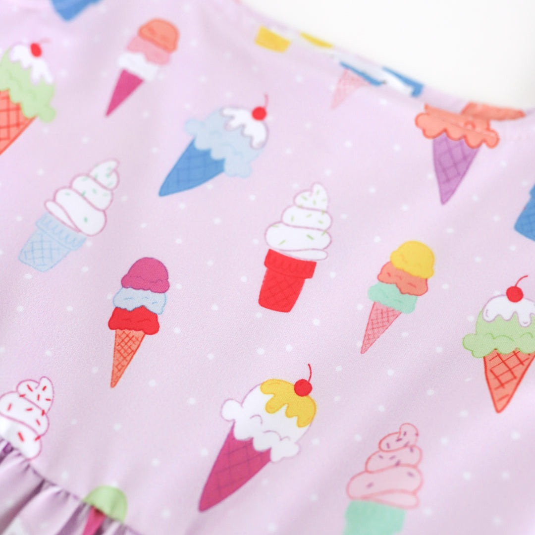 print detail photo for girl's summer twirl dress with multicolor ice cream cones and small white polkadots