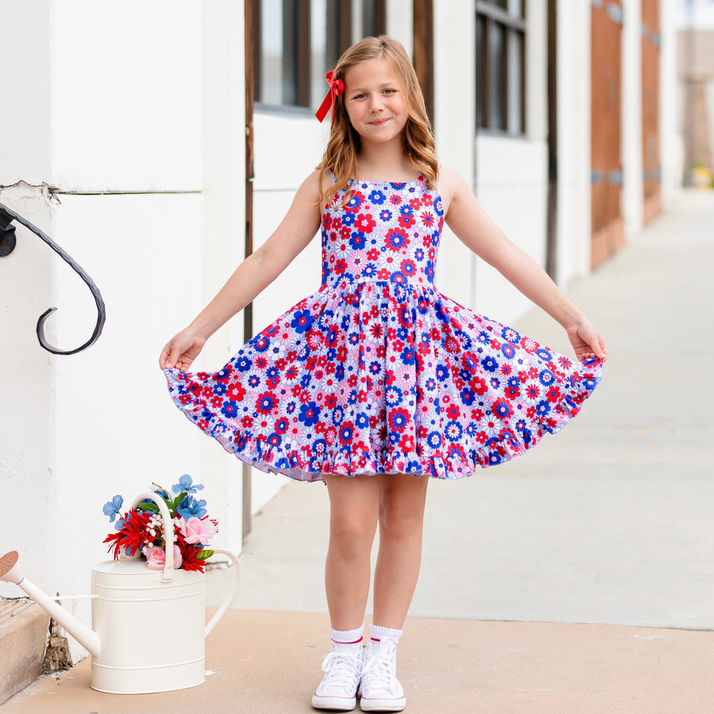 girl in floral 4th of july summer twirl dress