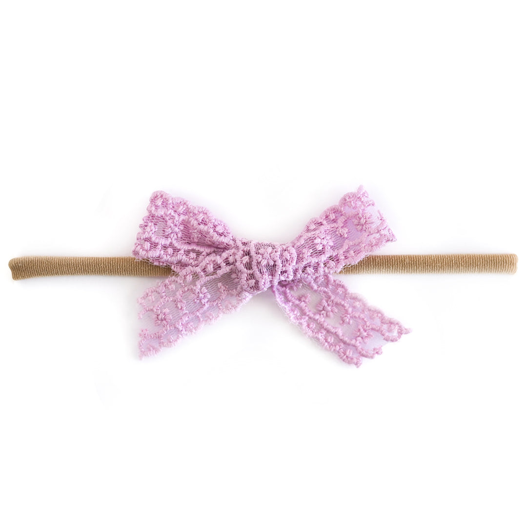 light purple lace baby bow on tan nylon band