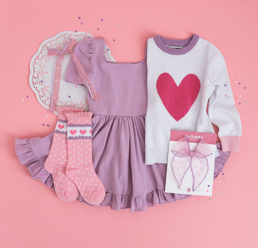 head to toe girl's Valentine's outfit featuring lavender twirl dress, darling heart sweater and matching knee high socks and hair bows